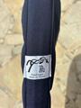 tapis de selle Penelope Leprevost bleu marine liseret rouge et blanc