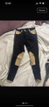Pantalon noir et beige