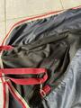 couvre reins imperméable bleu et rouge