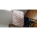 Tapis rose pâle