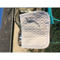 Tapis blanc dressage