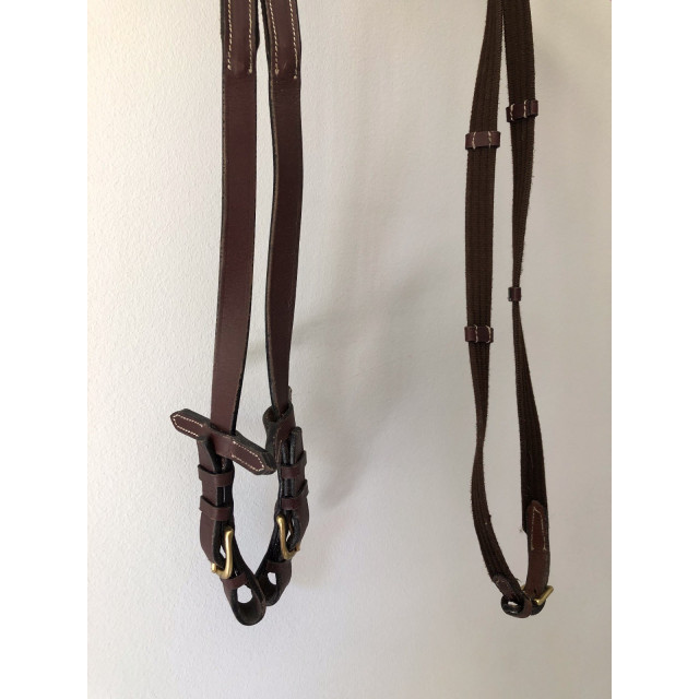 Filet Norton marron taille cob. Bon état. Vendu avec ses rênes.