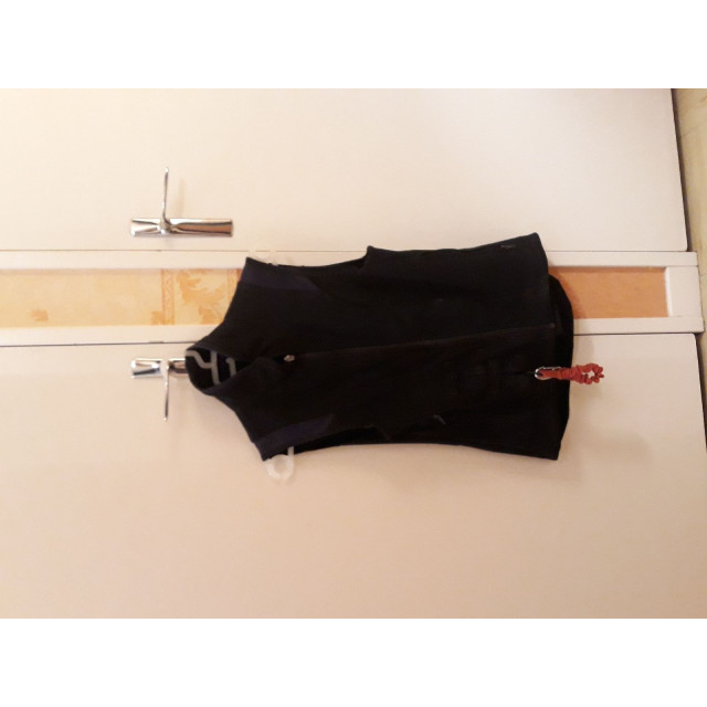 Ensemble gilet et veste de concours avec airbag intégré