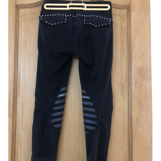 pantalon noir animo à strass et gripps