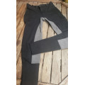 Pantalon Fouganza noir/gris taille 14 ans