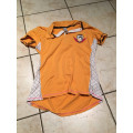 Polo orange Fouganza