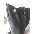 Bottes en simili-cuir noires