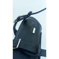 Guetre cuir noir fausses boucles