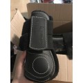 Guêtres et protèges boulets en cuir