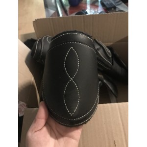 Guêtres et protèges boulets en cuir