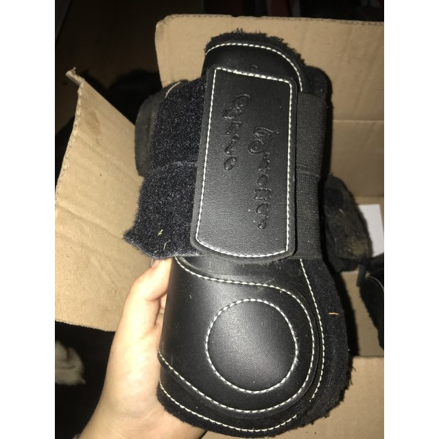 Guêtres et protèges boulets en cuir