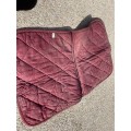 Tapis bordeaux dressage