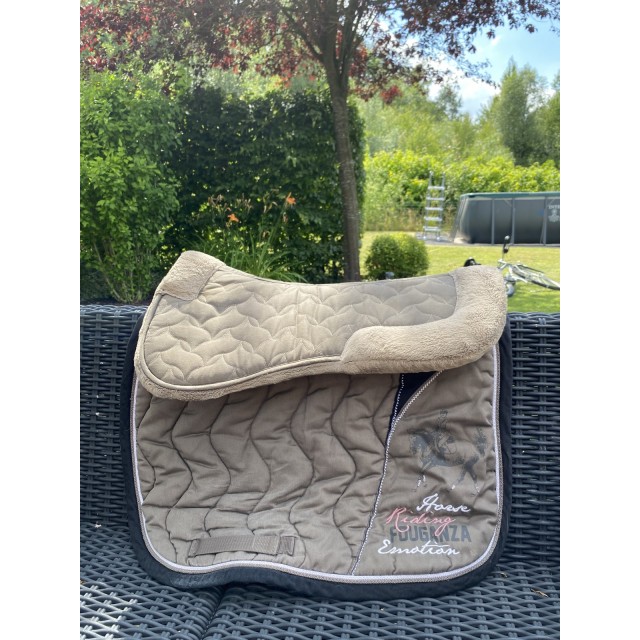 Tapis de selle et amortisseur