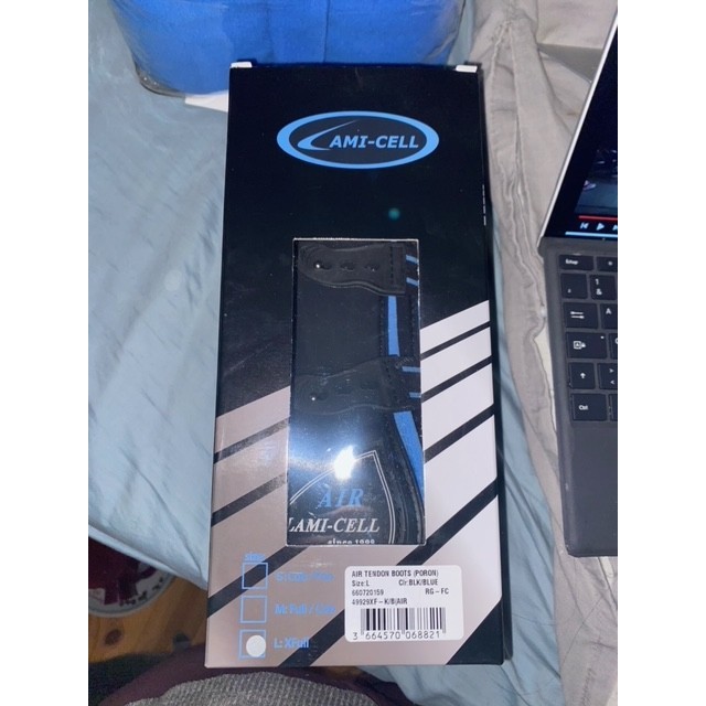 Guêtres bleu/noir lami-cell neuves