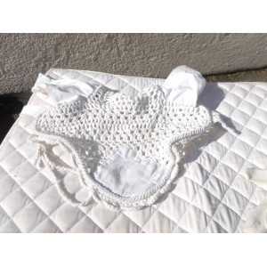 Tapis, bonnet et gants blanc