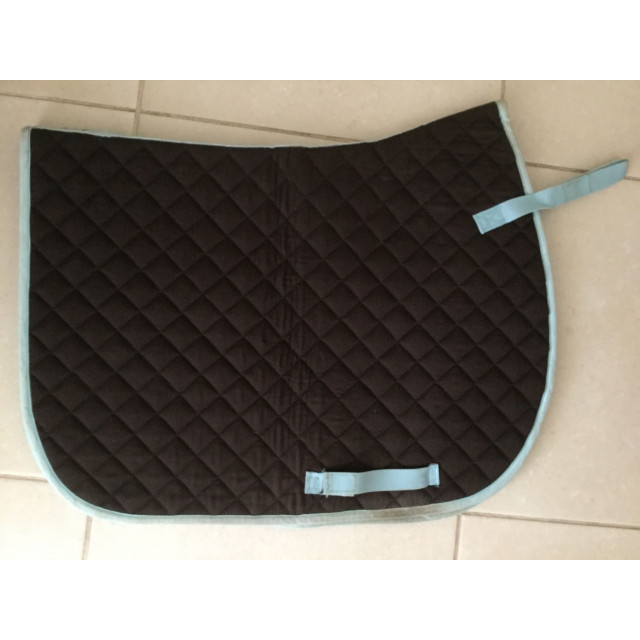 Tapis marron a bordure bleu claire