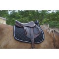 Tapis de selle avec poche pour téléphone