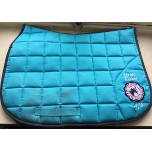 Tapis de selle en très bon état