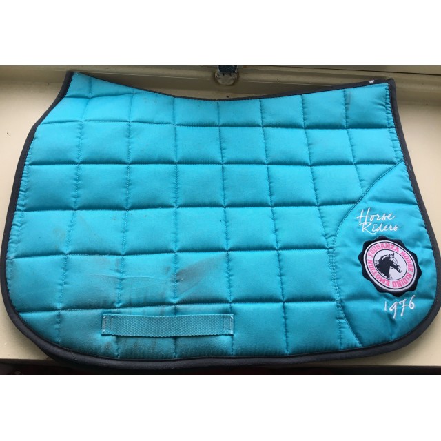 Tapis de selle en très bon état