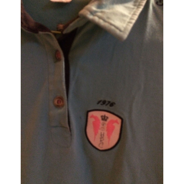 Polo bleu fouganza