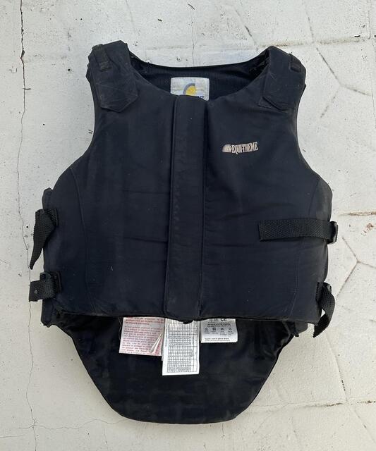 Gilet de protection / protège dos