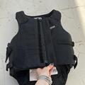 Gilet de protection / protège dos