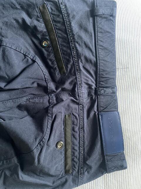 Pantalon cavalière bleu marine avec strass aux poches et derrière la ceinture