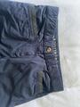 Pantalon cavalière bleu marine avec strass aux poches et derrière la ceinture