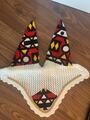 Ensemble composé d’un tapis, d’un bonnet et d’un sac de pansage