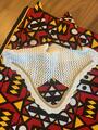 Ensemble composé d’un tapis, d’un bonnet et d’un sac de pansage