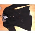 Veste pikeur noir et marron bonne état