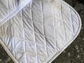 Tapis blanc bordure brillant argent