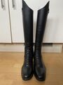 Bottes en cuir neuves de la marque Tucci avec petit défaut (voir photos).