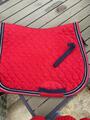 Tapis HKM rouge taille cheval très bon état