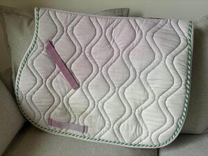 Tapis rose pâle