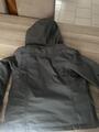 K-way vert foncé et motif fleur