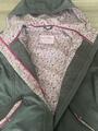 K-way vert foncé et motif fleur