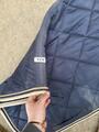 Tapis HFI bleu marine et bordures beiges